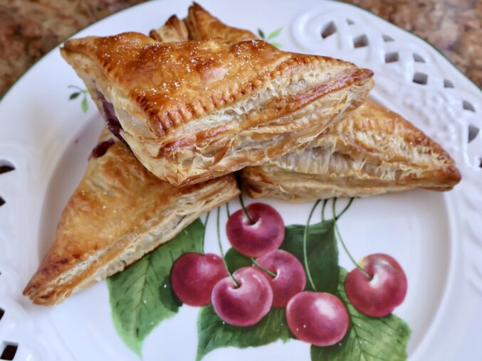 Cherry turnovers on a cherry plate