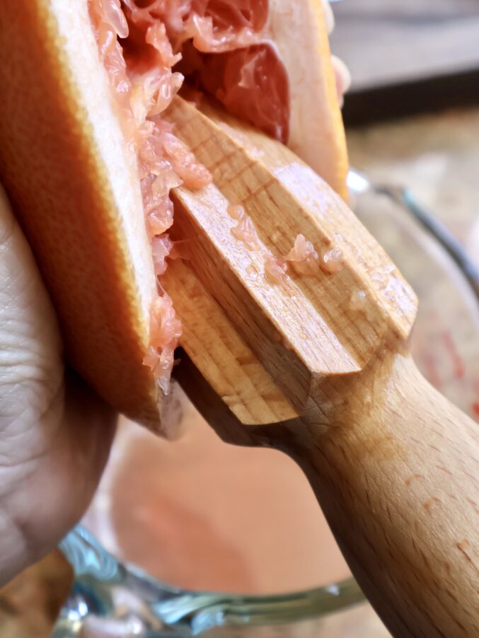 squeezing grapefruit