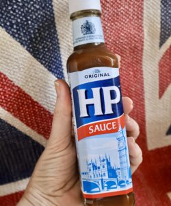 HP Sauce bottle in hand