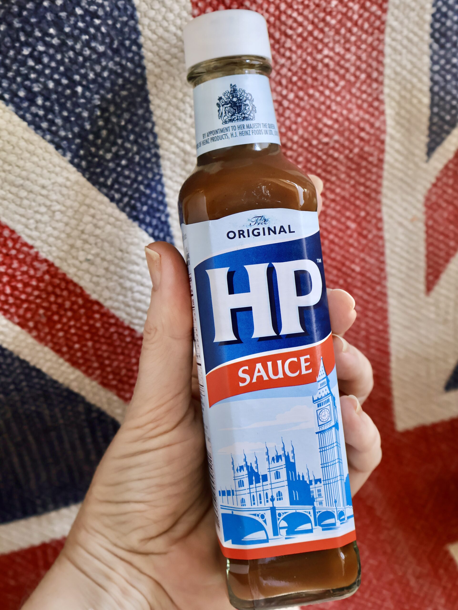 HP Sauce bottle in hand