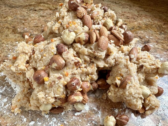 dough and nuts on counter