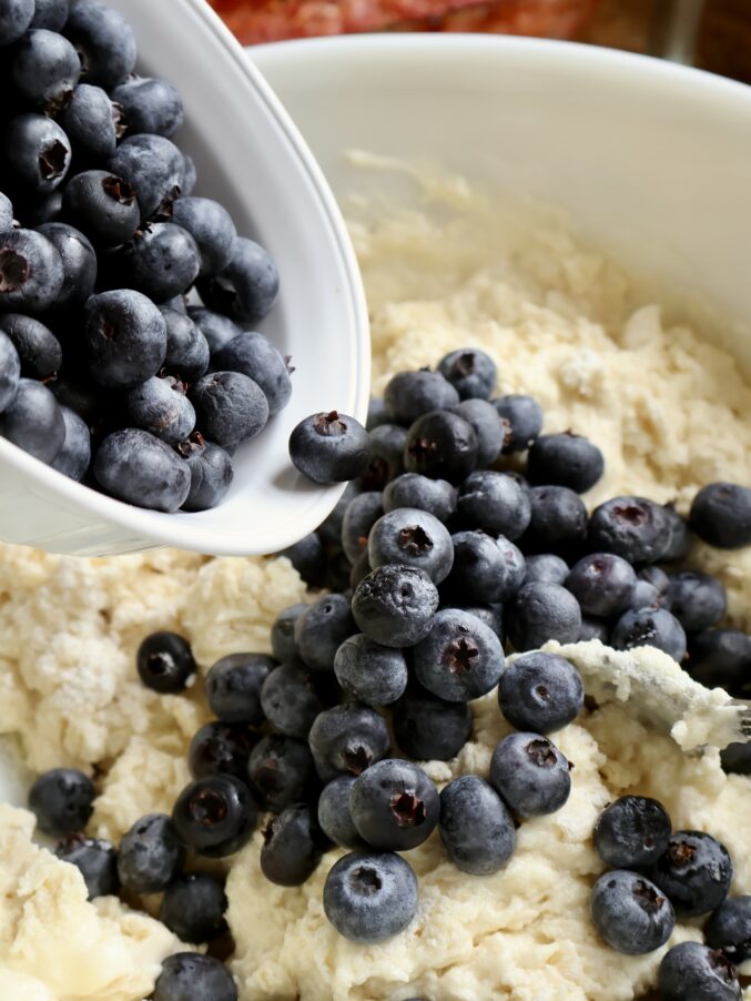 adding blueberries