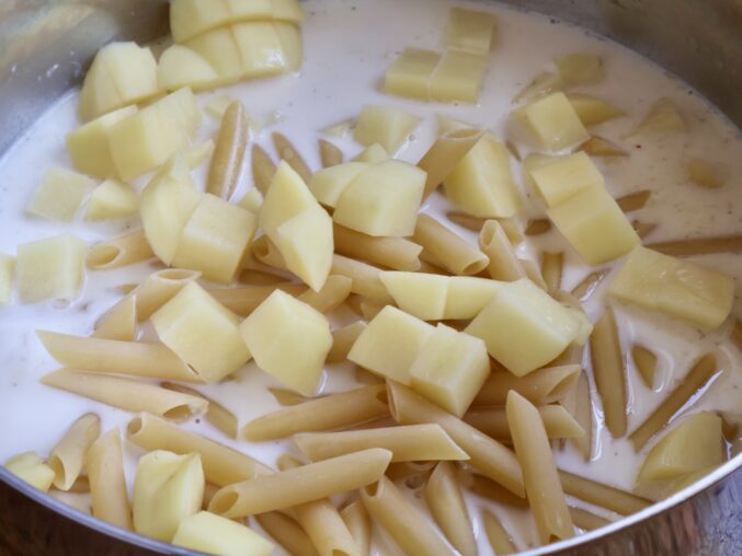 adding potato cubes