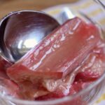 putting stewed rhubarb into a serving bowl