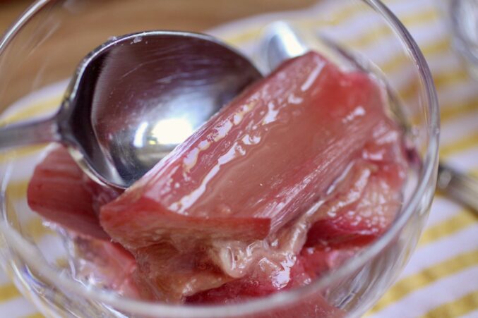 putting stewed rhubarb into a serving bowl