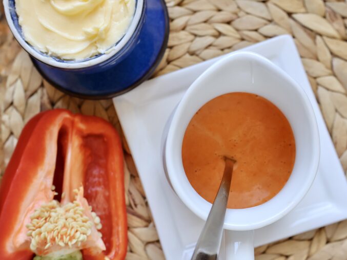 red bell pepper sauce in a jug