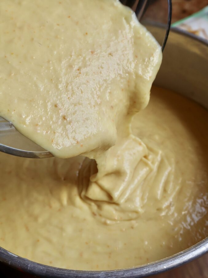 pouring batter into pan