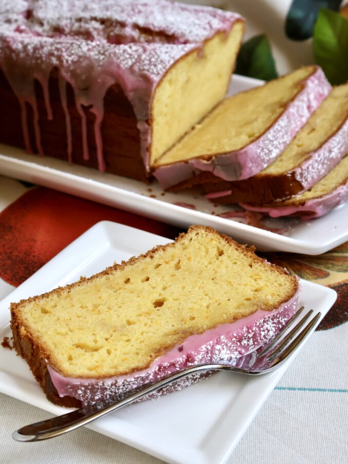 Loaf cake decorated with blood orange icing