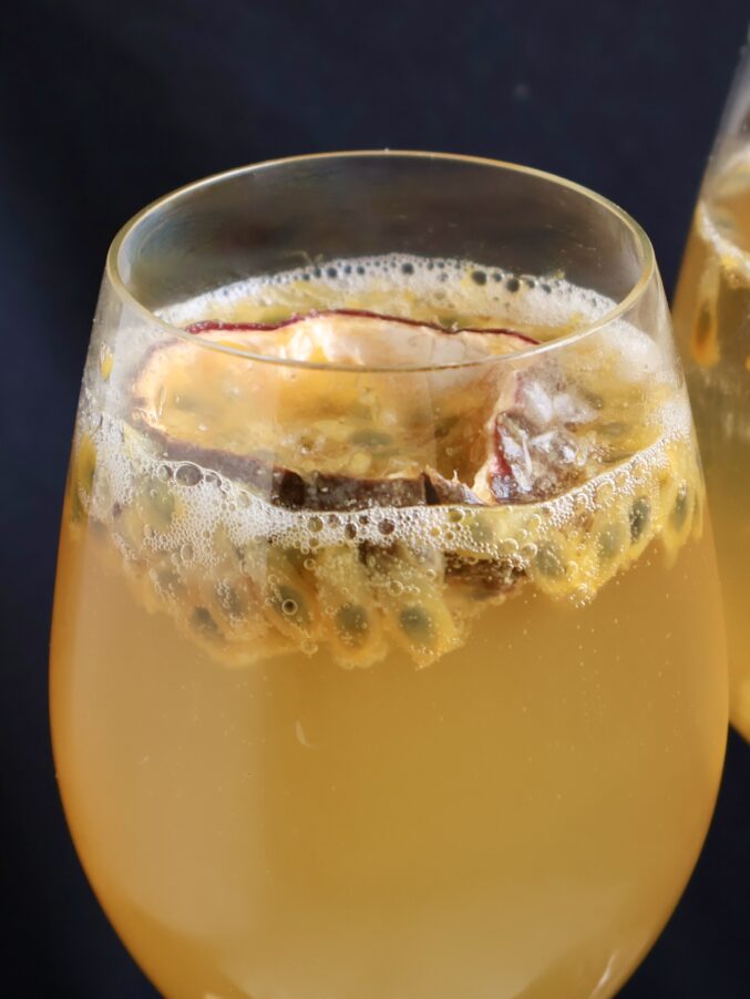passion fruit floating in glass