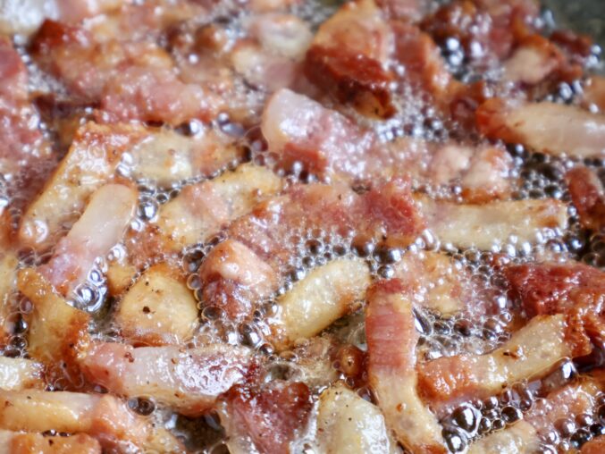 frying guanciale in lard