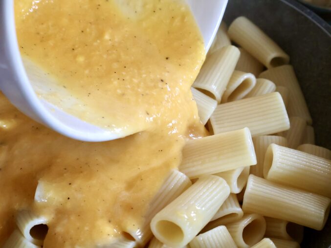 adding egg and Pecorino mixture