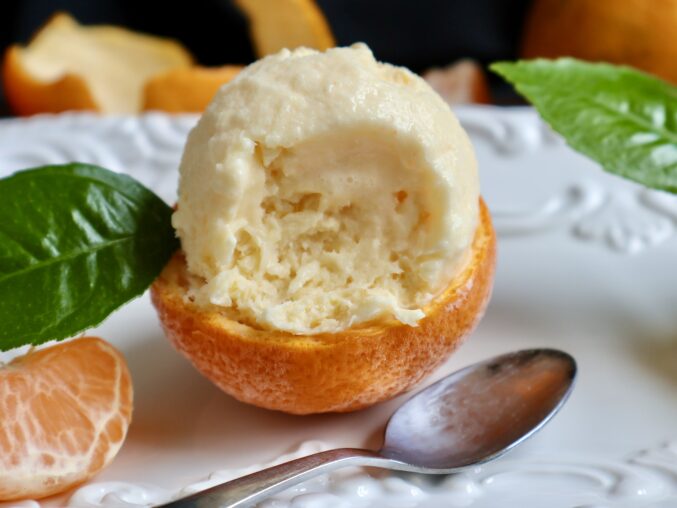 eating tangerine ice cream