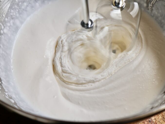 beating mascarpone cheese and cream