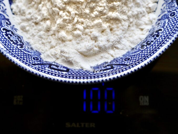flour being weighed