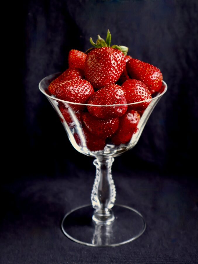 fresh strawberries in a coupe glass