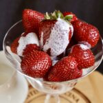 horizontal strawberries and cream with jug