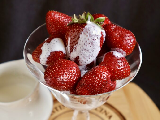 horizontal strawberries and cream with jug