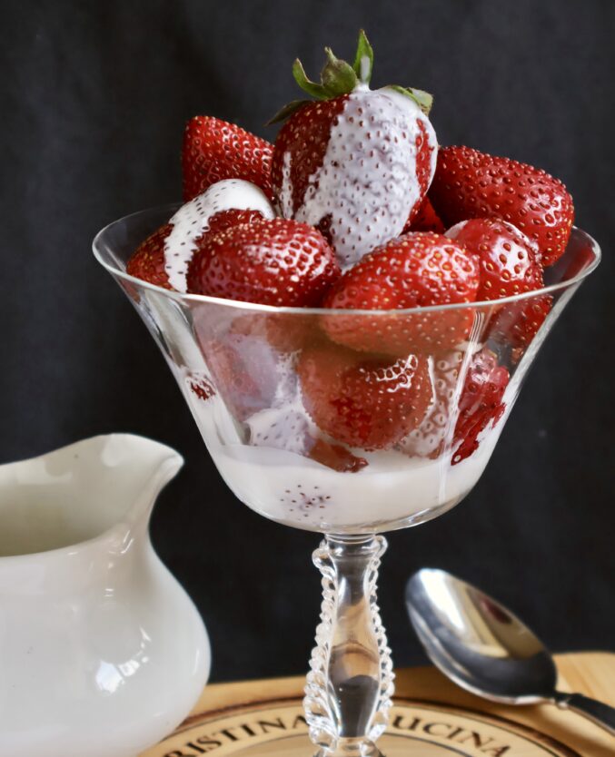 strawberries and cream close vertical
