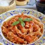 Gigli pasta in Italian bowl hero