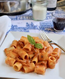 rigatoni alla vodka with wine glass
