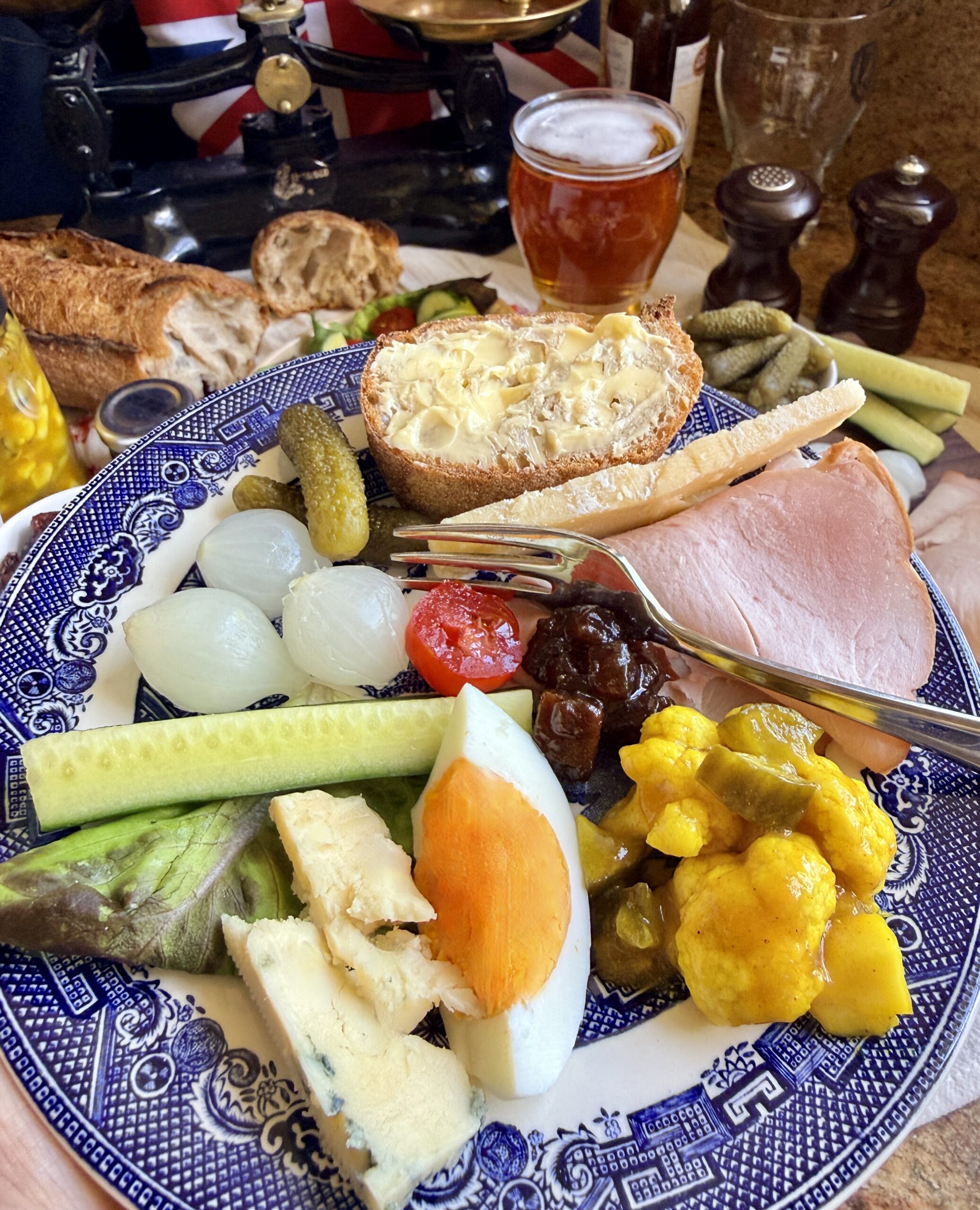 ploughman's lunch on a Blue Willow plate