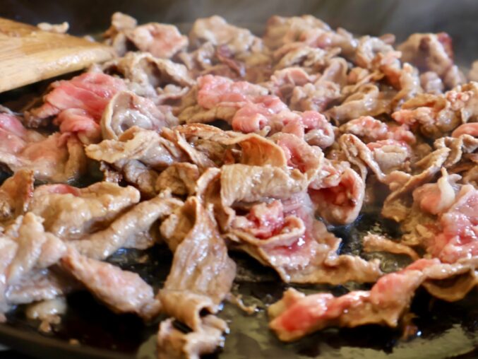 cooking beef in pan