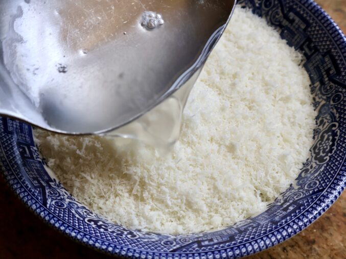 adding starchy water to the cheese